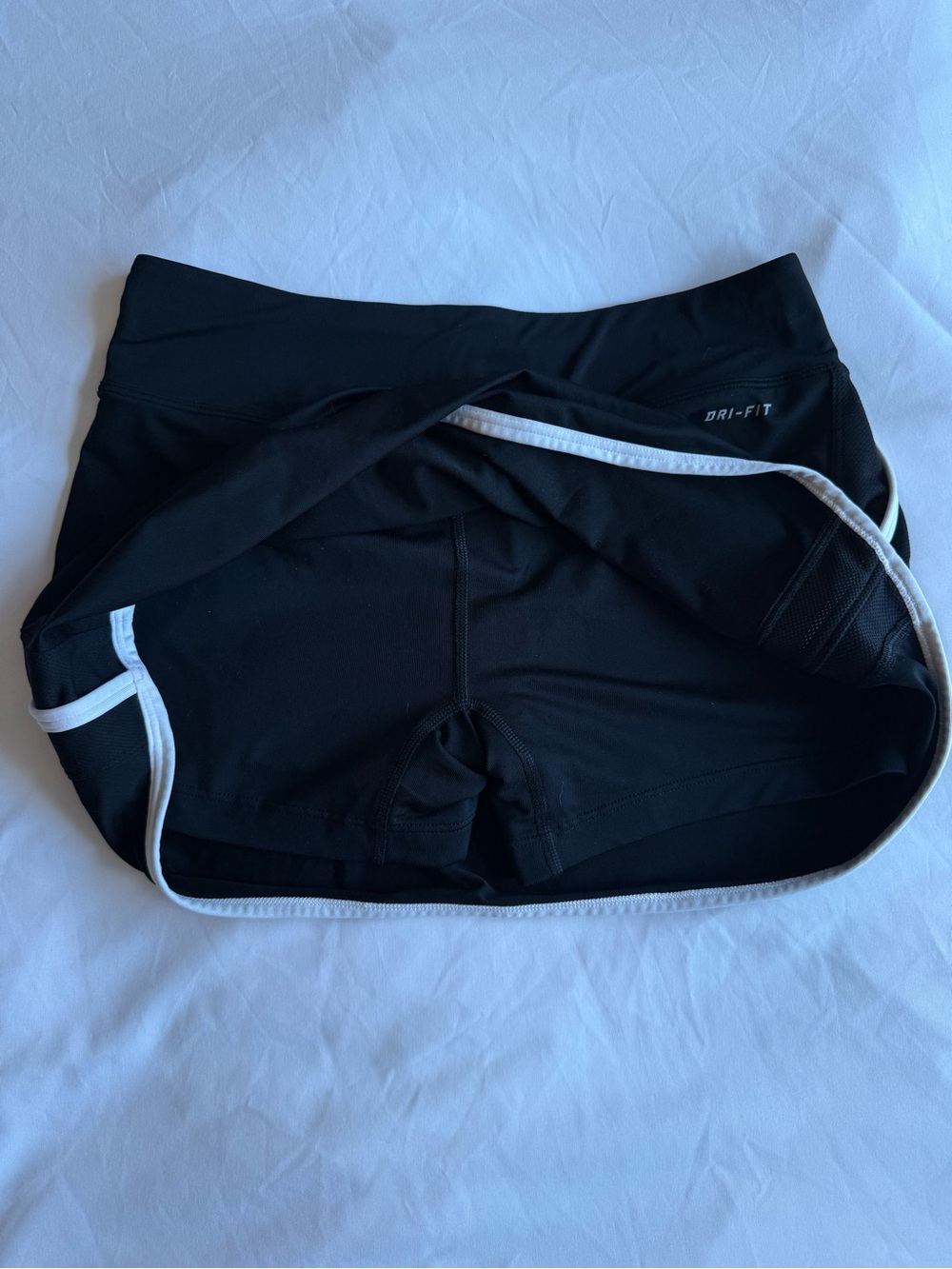 Nike Women’s Black Skort with White Trim and Swoosh - Picture 3 of 4